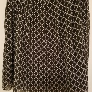 Skirt..sheer top material with black liner